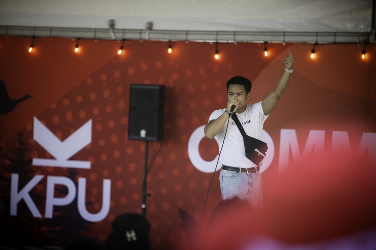 Person performing on the community stage